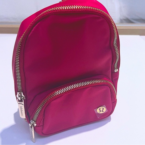 lululemon athletica Handbags - Lululemon Everywhere Sling Bag 2L Berry Rumble With Silver Hardware NWT
